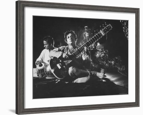 Ravi Shankar Passionately Playing the Sitar-Paul Schutzer-Framed Premium Photographic Print