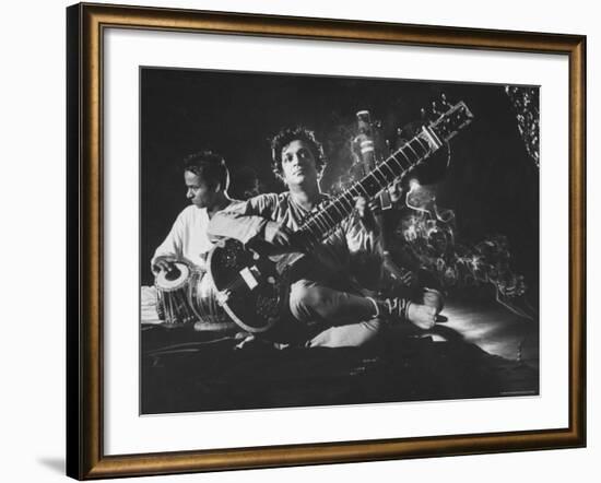 Ravi Shankar Passionately Playing the Sitar-Paul Schutzer-Framed Premium Photographic Print