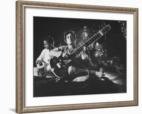 Ravi Shankar Passionately Playing the Sitar-Paul Schutzer-Framed Premium Photographic Print