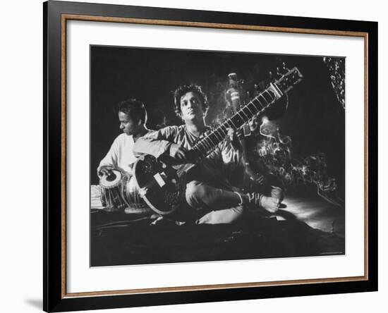 Ravi Shankar Passionately Playing the Sitar-Paul Schutzer-Framed Premium Photographic Print