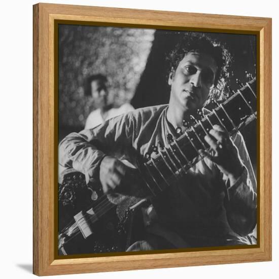 Ravi Shankar Passionately Playing the Sitar-Paul Schutzer-Framed Premier Image Canvas