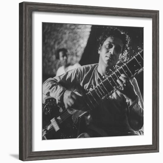 Ravi Shankar Passionately Playing the Sitar-Paul Schutzer-Framed Premium Photographic Print