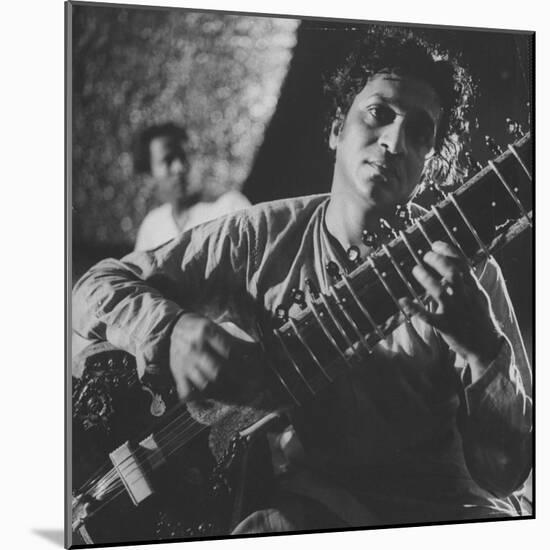 Ravi Shankar Passionately Playing the Sitar-Paul Schutzer-Mounted Premium Photographic Print