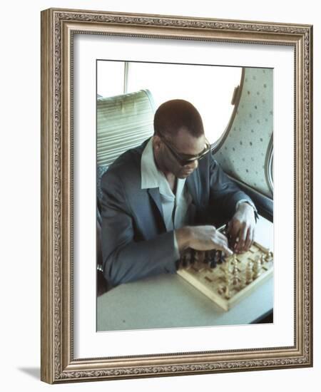 Ray Charles Playing Chess on the Tour Bus-null-Framed Photo