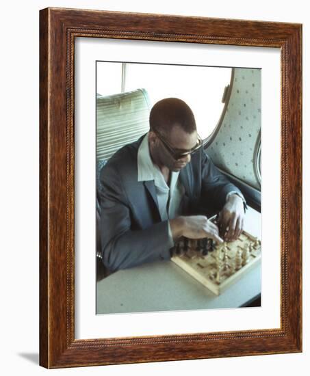 Ray Charles Playing Chess on the Tour Bus-null-Framed Photo