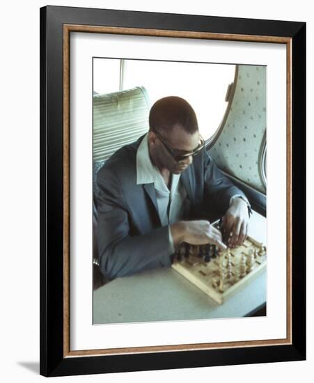 Ray Charles Playing Chess on the Tour Bus-null-Framed Photo