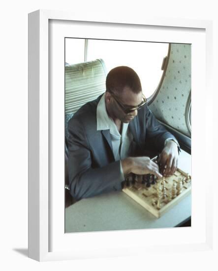 Ray Charles Playing Chess on the Tour Bus-null-Framed Photo