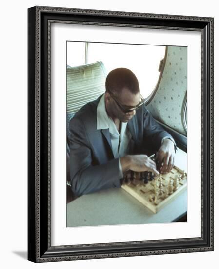 Ray Charles Playing Chess on the Tour Bus-null-Framed Photo