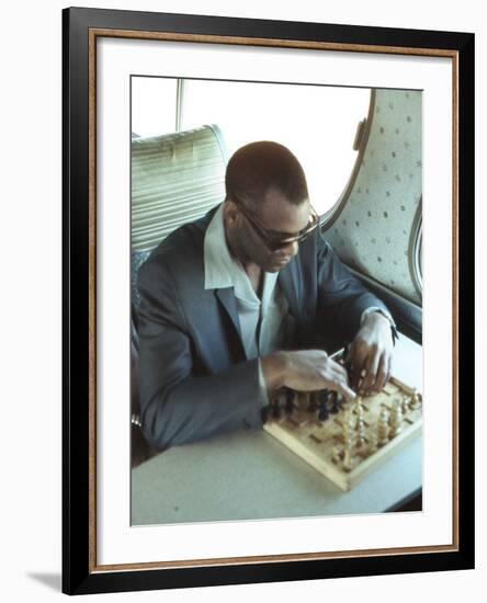 Ray Charles Playing Chess on the Tour Bus-null-Framed Photo