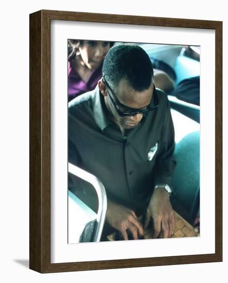 Ray Charles Playing Chess on the Tour Bus-null-Framed Photo