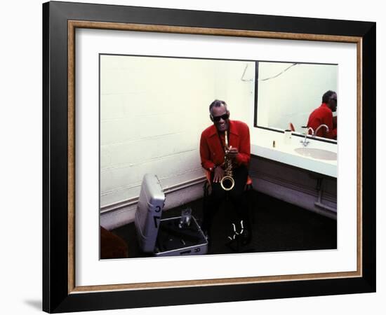 Ray Charles with His Alto Saxophone Backstage-null-Framed Photo