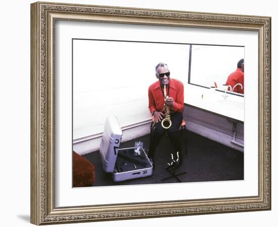 Ray Charles with His Alto Saxophone Backstage-null-Framed Photo