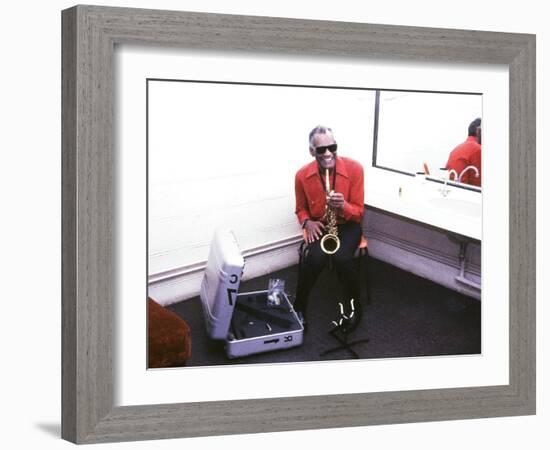 Ray Charles with His Alto Saxophone Backstage-null-Framed Photo