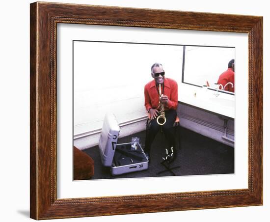 Ray Charles with His Alto Saxophone Backstage-null-Framed Photo