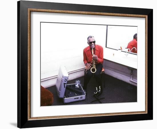 Ray Charles with His Alto Saxophone Backstage-null-Framed Photo