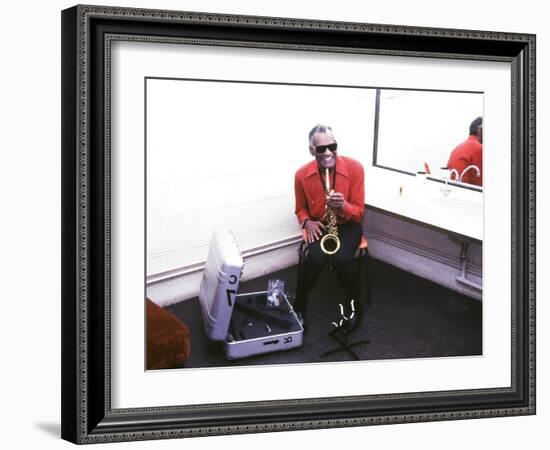 Ray Charles with His Alto Saxophone Backstage-null-Framed Photo