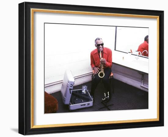 Ray Charles with His Alto Saxophone Backstage-null-Framed Photo