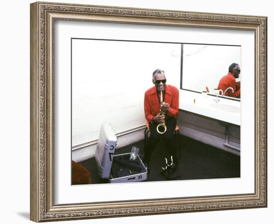 Ray Charles with His Alto Saxophone Backstage-null-Framed Photo