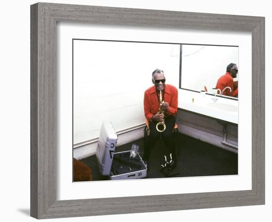 Ray Charles with His Alto Saxophone Backstage-null-Framed Photo