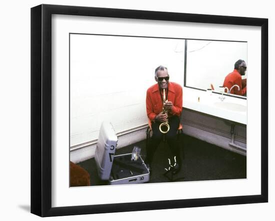 Ray Charles with His Alto Saxophone Backstage-null-Framed Photo