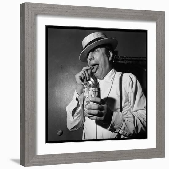 Raymond Devos Eating a Candy-Thérese Begoin-Framed Photographic Print