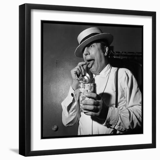 Raymond Devos Eating a Candy-Thérese Begoin-Framed Photographic Print