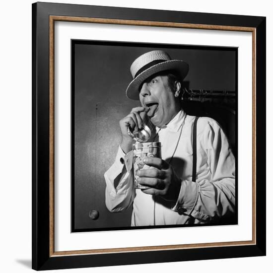 Raymond Devos Eating a Candy-Thérese Begoin-Framed Photographic Print