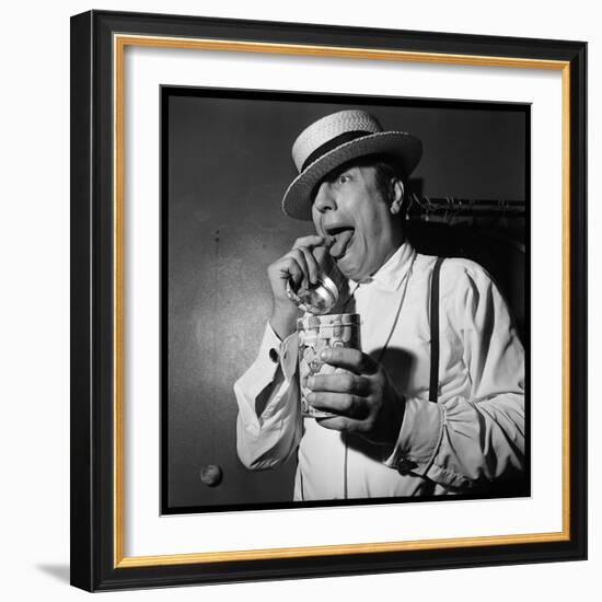 Raymond Devos Eating a Candy-Thérese Begoin-Framed Photographic Print