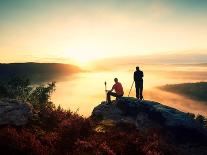 Hiker Sit and Photographer with Tripod on Rock Takes Magnificent Photos. Dreamy Foggy Mountains, Mi-rdonar-Photographic Print