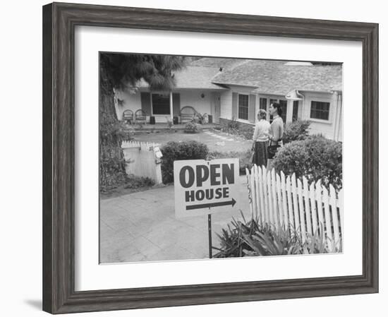 Realtor Pat Devault Showing a House to Her Clients-J^ R^ Eyerman-Framed Photographic Print