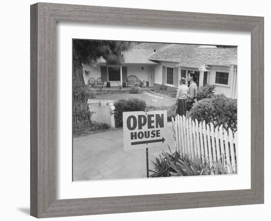 Realtor Pat Devault Showing a House to Her Clients-J^ R^ Eyerman-Framed Photographic Print