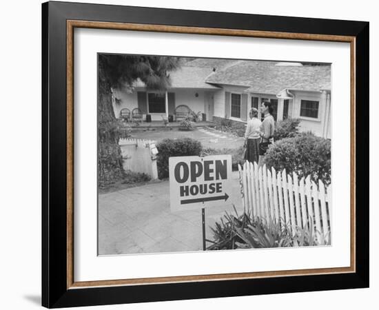 Realtor Pat Devault Showing a House to Her Clients-J^ R^ Eyerman-Framed Photographic Print