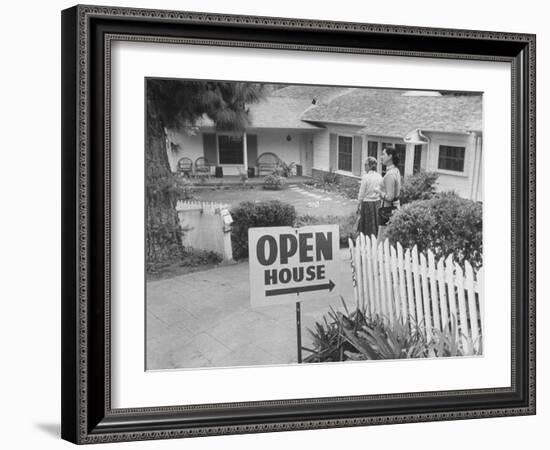 Realtor Pat Devault Showing a House to Her Clients-J^ R^ Eyerman-Framed Photographic Print