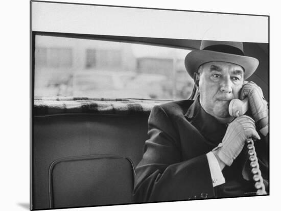 Realtor William J. Zeckendorf, Sitting in the Back Seat of His Limousine Talking on the Telephone-John Loengard-Mounted Premium Photographic Print