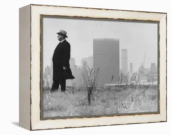 Realtor William J. Zeckendorf, Standing in the Wind Fields Located on the Outskirts of the City-John Loengard-Framed Premier Image Canvas