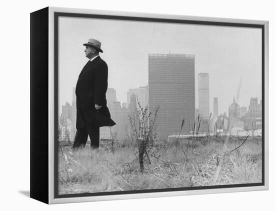 Realtor William J. Zeckendorf, Standing in the Wind Fields Located on the Outskirts of the City-John Loengard-Framed Premier Image Canvas