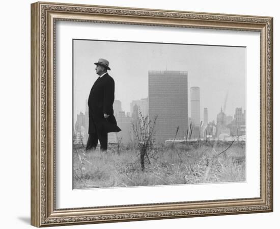 Realtor William J. Zeckendorf, Standing in the Wind Fields Located on the Outskirts of the City-John Loengard-Framed Premium Photographic Print