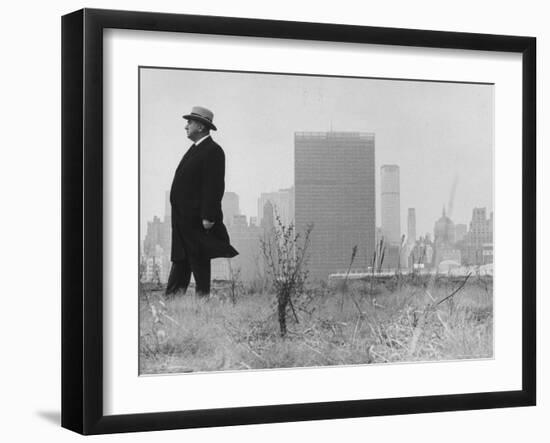 Realtor William J. Zeckendorf, Standing in the Wind Fields Located on the Outskirts of the City-John Loengard-Framed Premium Photographic Print