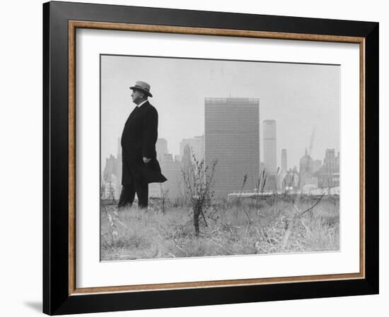 Realtor William J. Zeckendorf, Standing in the Wind Fields Located on the Outskirts of the City-John Loengard-Framed Premium Photographic Print