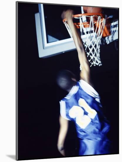 Rear View of a Teenage Boy Playing Basketball-null-Mounted Photographic Print