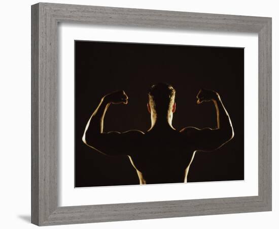 Rear View of a Young Man Flexing His Muscles-null-Framed Photographic Print