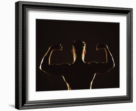 Rear View of a Young Man Flexing His Muscles-null-Framed Photographic Print