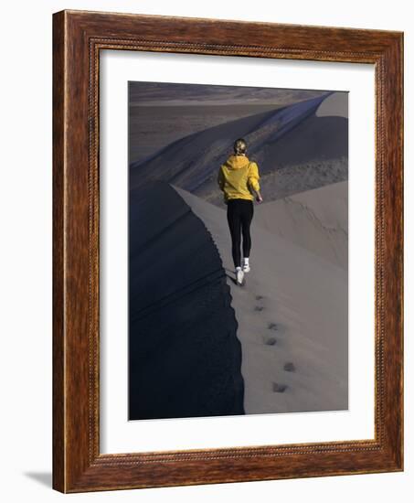 Rear View of a Young Woman Running on a Sand Dune-null-Framed Photographic Print