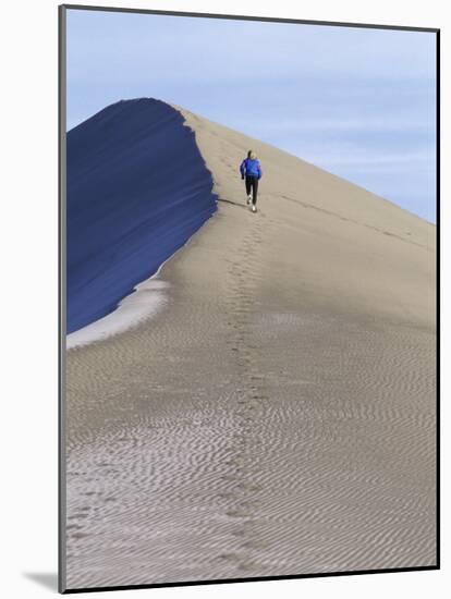 Rear View of Woman Running Up a Sand Dune-null-Mounted Photographic Print