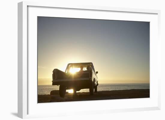 Rear View of Young Couple in Pick-Up Truck Parked in Front of Ocean Enjoying Sunset-Nosnibor137-Framed Photographic Print