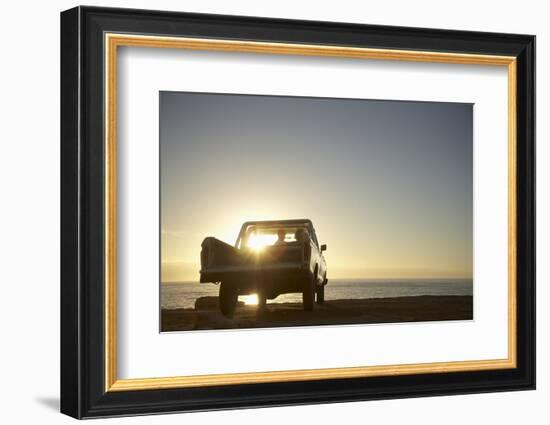 Rear View of Young Couple in Pick-Up Truck Parked in Front of Ocean Enjoying Sunset-Nosnibor137-Framed Photographic Print