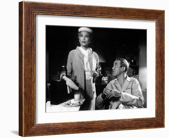 REAR WINDOW, 1954 directed byALFRED HITCHCOCK Grace Kelly and James Stewart (b/w photo)-null-Framed Photo