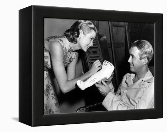 REAR WINDOW, 1954 directed byALFRED HITCHCOCK On the set, Grace Kelly and James Stewart (b/w photo)-null-Framed Stretched Canvas