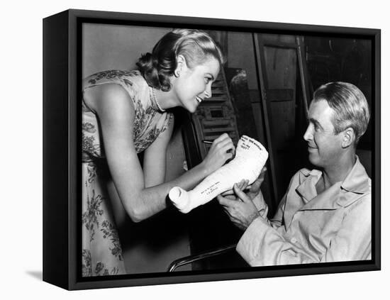 REAR WINDOW, 1954 directed byALFRED HITCHCOCK On the set, Grace Kelly and James Stewart (b/w photo)-null-Framed Stretched Canvas