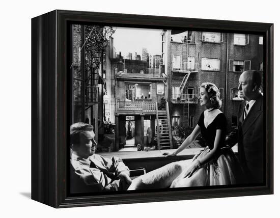 REAR WINDOW, 1954 directed byALFRED HITCHCOCK On the set, Grace Kelly between James Stewart and Alf-null-Framed Stretched Canvas